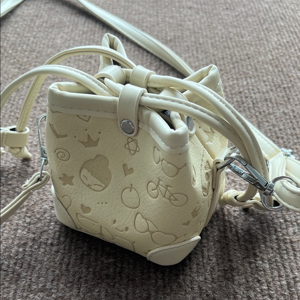 Cream Mini Crossbody Bag with Embossed Pattern